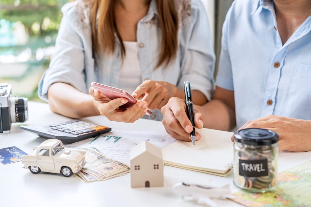 Young couple is planning and managing home expenses